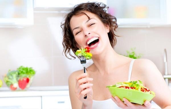 Image-Of-A-Woman-Eating-A-Salad image-of-a-woman-eating-a-salad